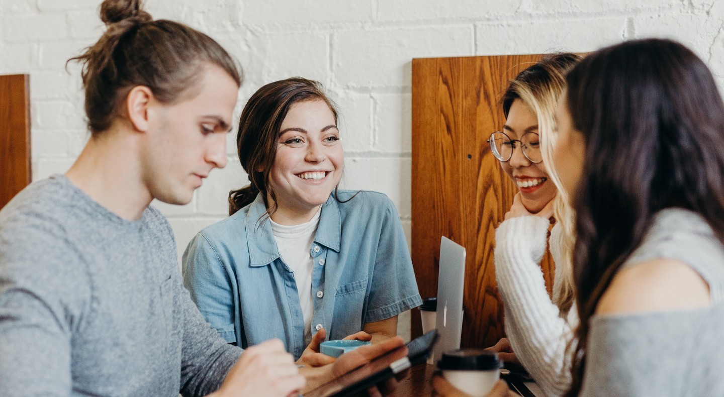 A team of young professionals have a meeting